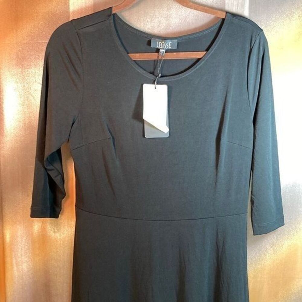 Black Lbisse stretch fit and flare dress. Made to flatter. 36” chest. 50” length
